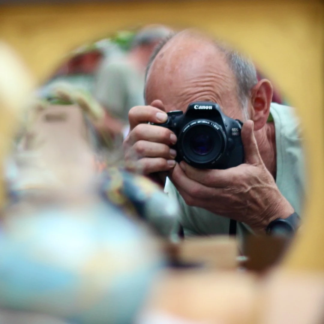 Alex achter zijn camera